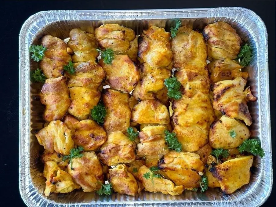 Catering tray of chicken kebab